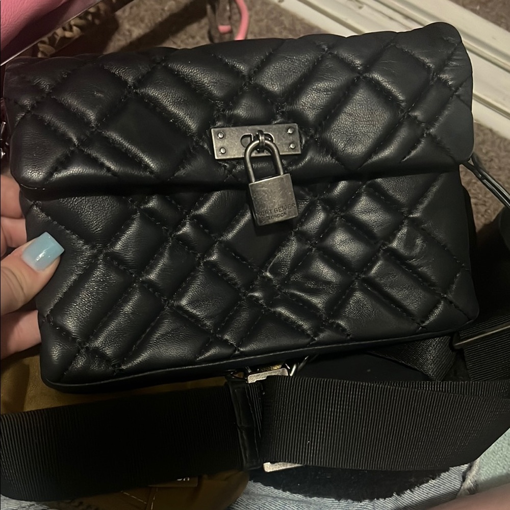 Quilted Black Handbag with Lock Detail